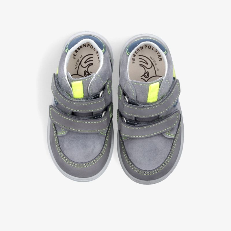 Robuste graue Kinderschuhe mit neongelben Details, rutschfeste Sohlen und verstellbare Klettverschlüsse für optimalen Halt