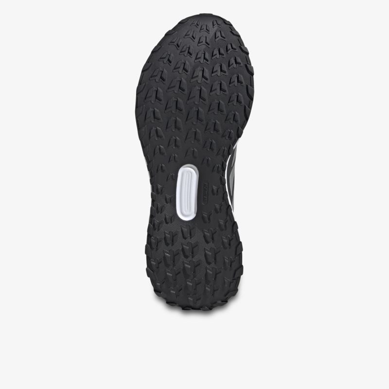 Detailaufnahme der schwarzen Schuhsohle mit robustem Profil für optimale Bodenhaftung und Langlebigkeit