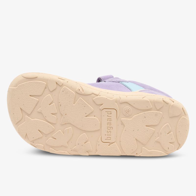 Lila Schuh mit robuster, rutschfester Sohle und strapazierfähiger Verarbeitung.