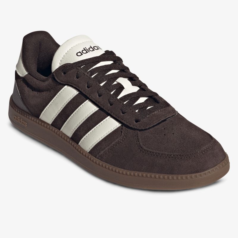 Schwarzer Sneaker mit weißen Streifen, sportliches Design und robustem Obermaterial, ideale Alltagswahl