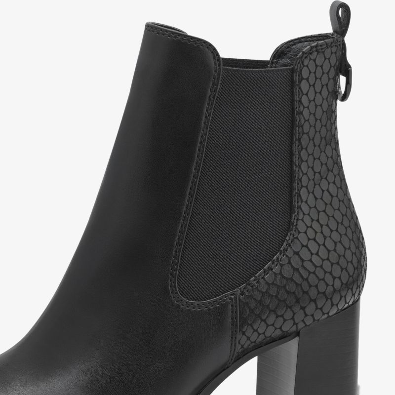 Eleganter schwarzer Stiefel mit hohem Blockabsatz und strukturiertem Ferseneinsatz für stilvollen Auftritt