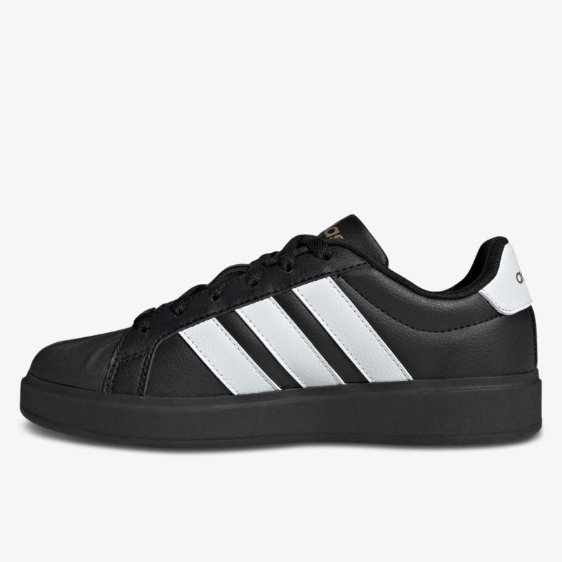 Seitliche Ansicht schwarzer Sneaker mit weißen Streifen und bequemer Passform