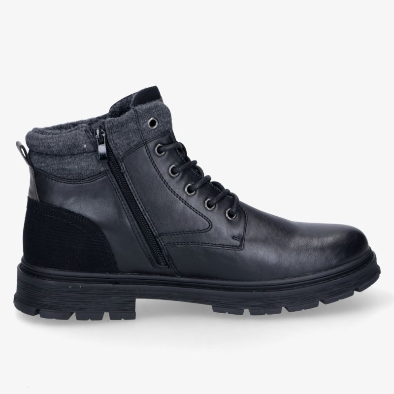 Eleganter schwarzer Stiefel mit seitlichem Reißverschluss und robuster Sohle für optimalen Tragekomfort.