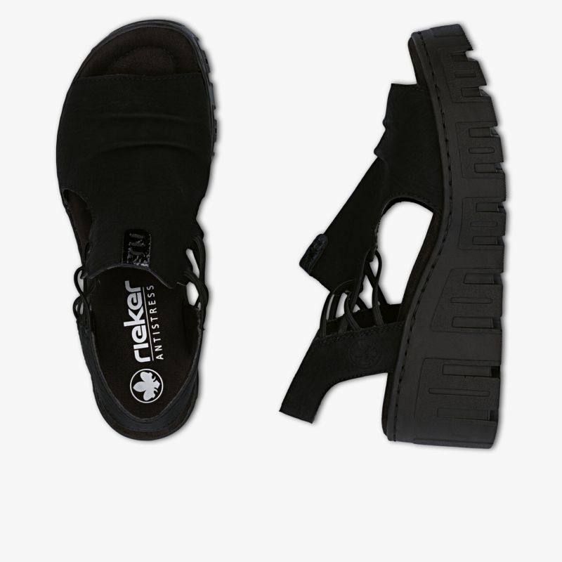 Bequeme schwarze Sandalen mit dicker rutschfester Sohle und verstellbarem Riemen für optimalen Halt