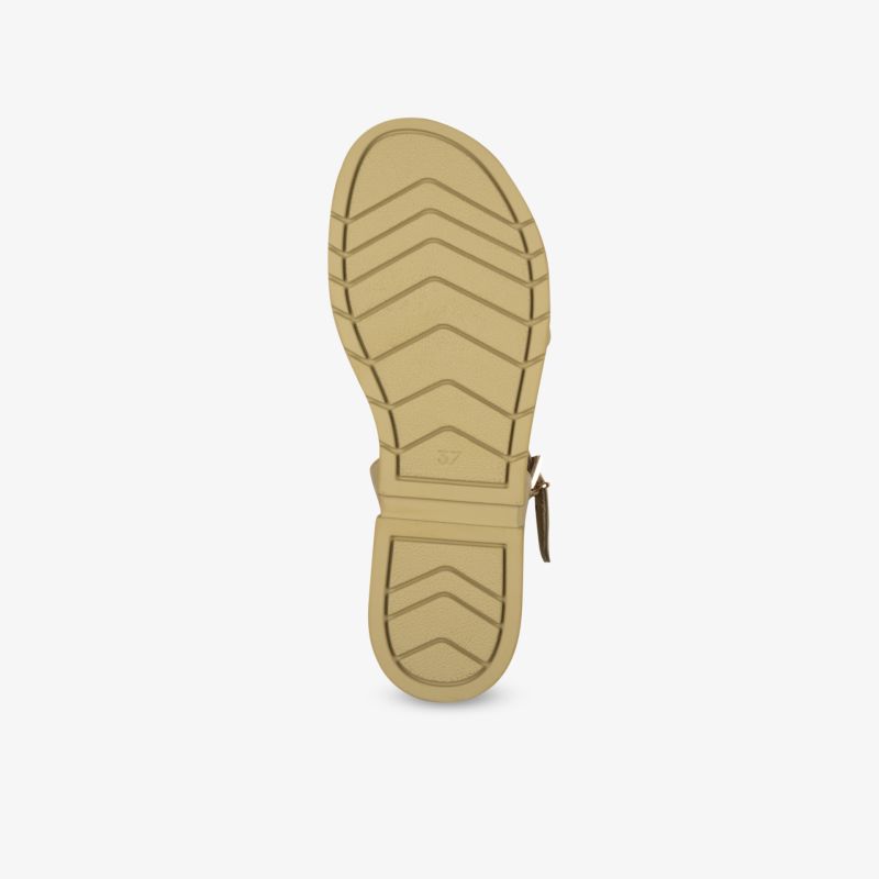 Robuste beige Schuhsohle mit rutschfestem Profil für sicheren Halt und langanhaltenden Komfort