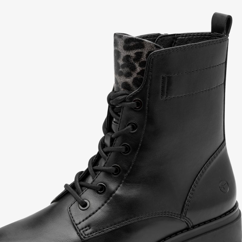 Schwarzer Lederstiefel mit Leopardenmuster und robuster Schnürung, modischer und langlebiger Boots-Stil