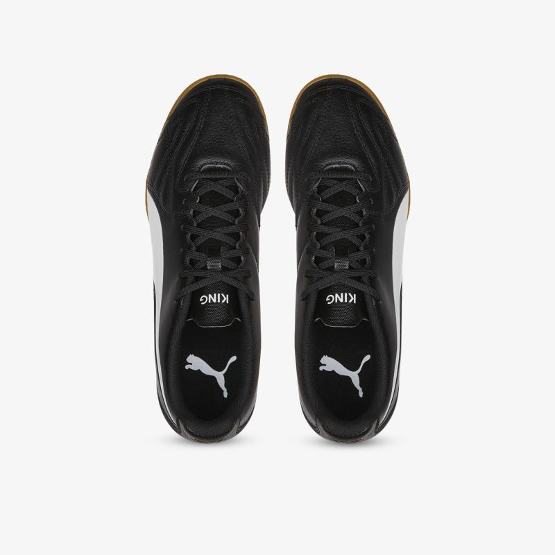 Klassische schwarze Sneaker mit stilvollem Design und Markenlogo, ideal für sportliche Aktivitäten und Alltag.