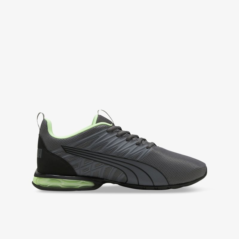 Leichter sportlicher Sneaker in Grau mit grüner Dämpfung, komfortabel und rutschfest, seitliche Ansicht
