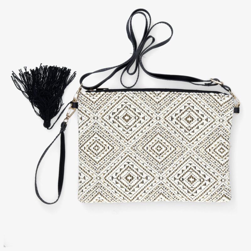 Elegante schwarz-weiße Tasche mit geometrischem Muster und dekorativen Fransen, kompakt und vielseitig einsetzbar