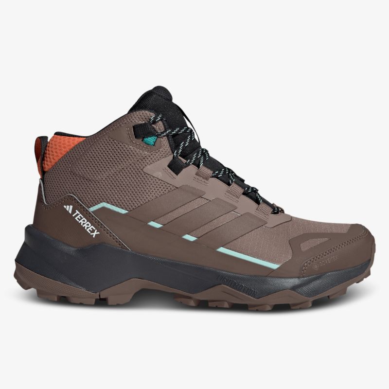 Seitliche Ansicht robuster wasserdichter Outdoorschuh mit hoher Sohle und atmungsaktivem Material