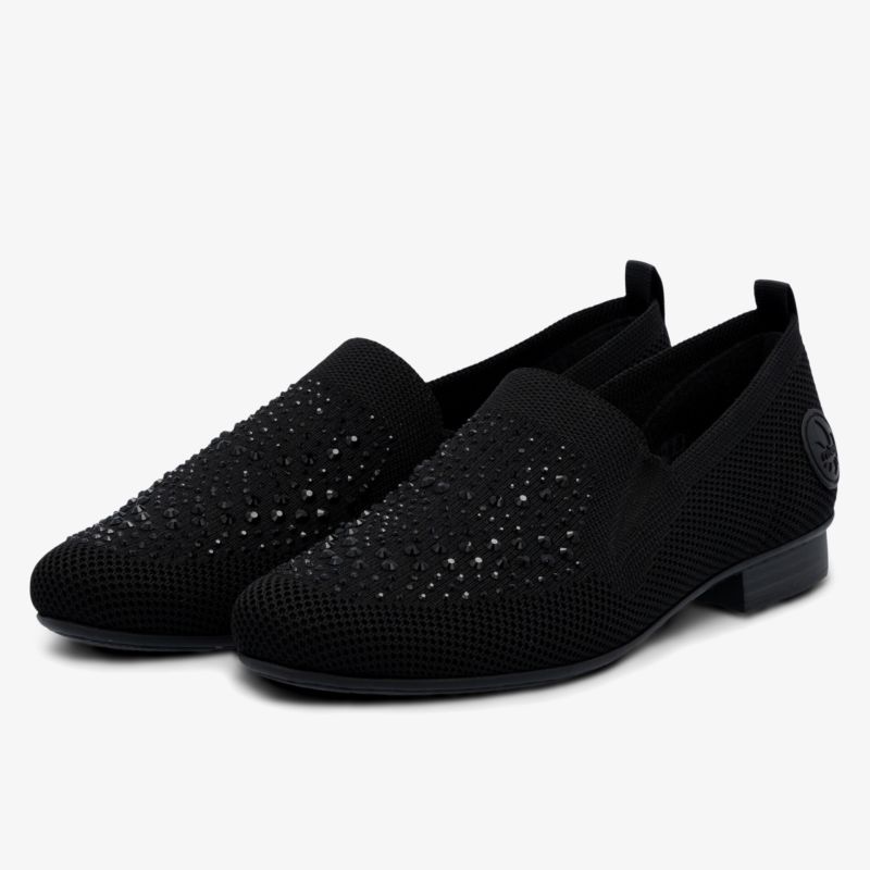 Schwarze Slipper mit glitzernden Details, bequemer Sitz und eleganter Look für vielseitigen Tragekomfort