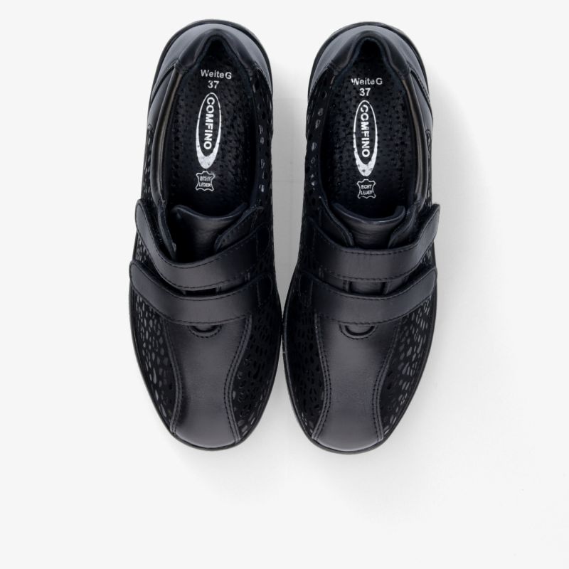 Schwarze komfortable Schuhe im Paar, ergonomisch gepolstert und strapazierfähig, ideal für den täglichen Gebrauch