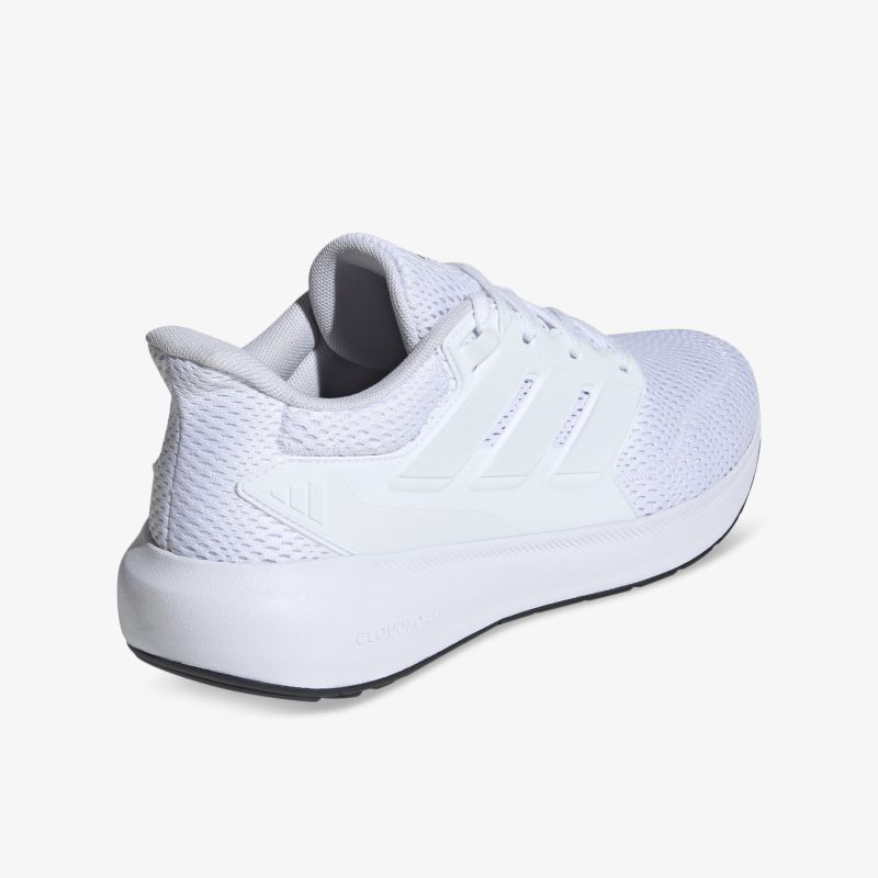 Weißer Sneaker mit gepolstertem Einstieg und flexiblem Sohlenprofil, seitlich hinten sichtbar