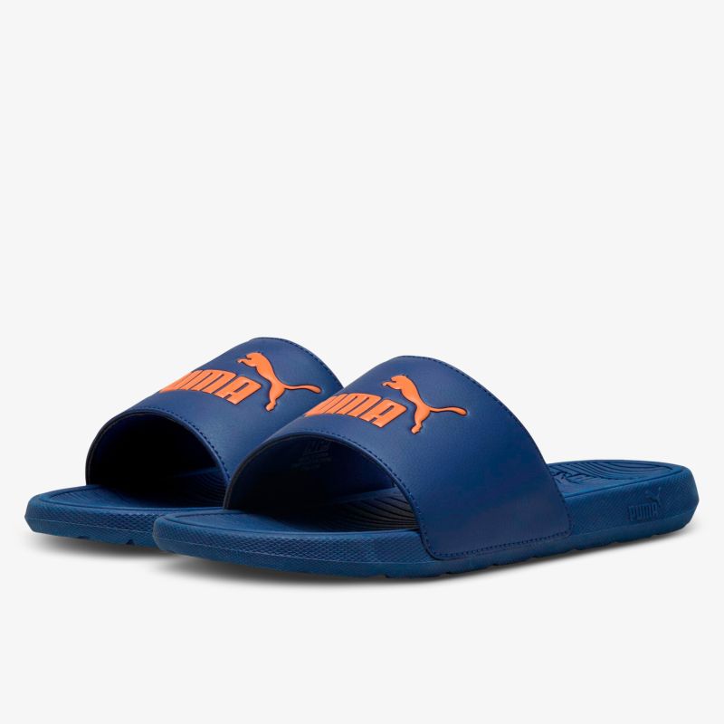 Bequeme und leichte blaue Puma Badesandalen mit rutschfester Sohle und einfachem Anziehkomfort