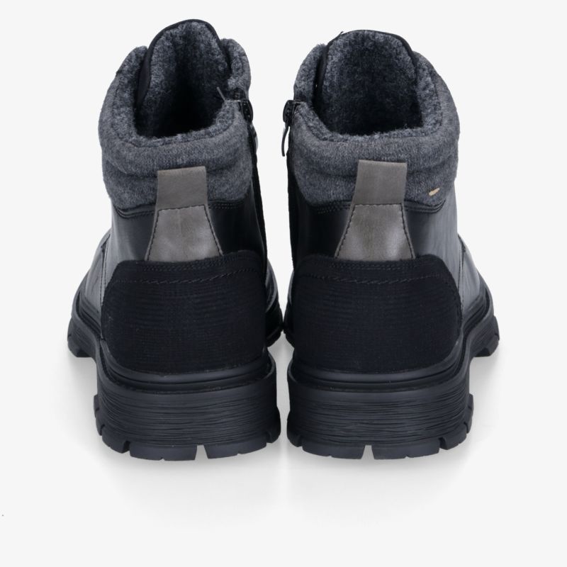 Wasserdichte und gefütterte Boots mit rutschfester Sohle für optimalen Komfort und Stabilität.